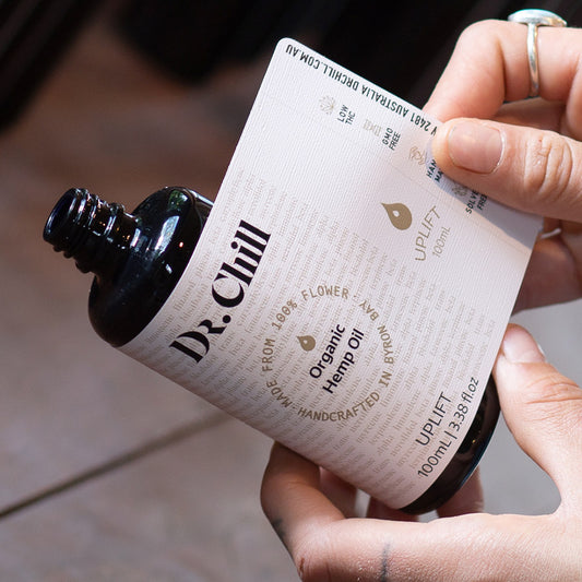 Adding label to Dr Chill Organic Hemp Oil Byron Bay Uplift Bottle